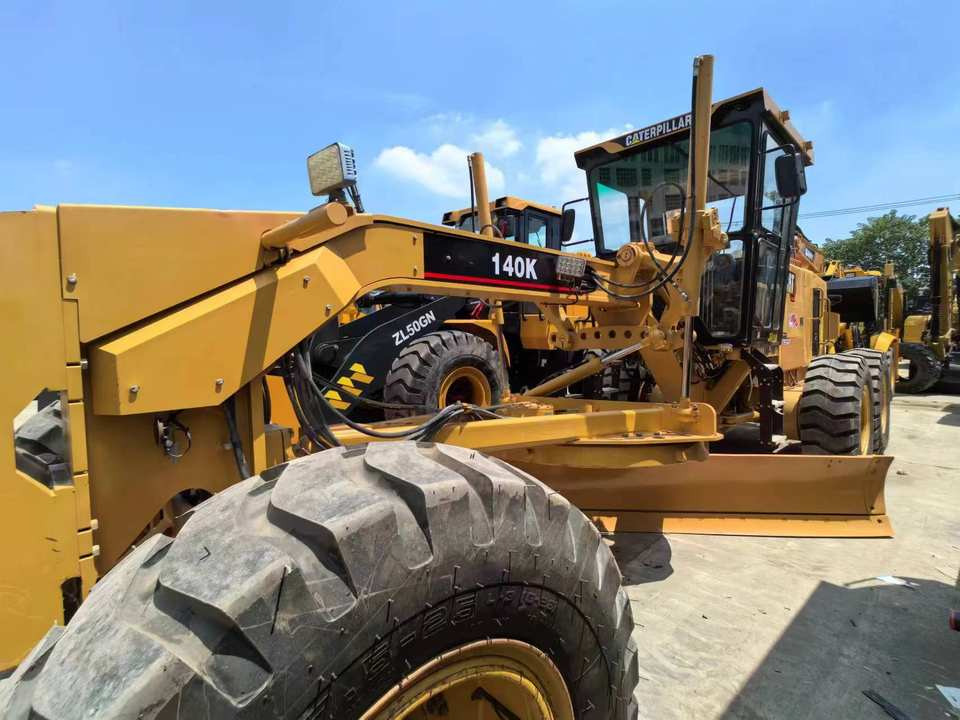 Second Hand Used Construction Machinery CAT 140K 15 Ton Grader for Sale 1000H From Shanghai Japanese Brand Good Condition - Grader: bilde 2 Second Hand Used Construction Machinery CAT 140K 15 Ton Grader for Sale 1000H From Shanghai Japanese Brand Good Condition - Grader: bilde 2