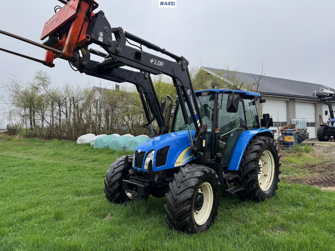 2006 New Holland TL100 A w/Front Loader. - Traktor: bilde 1 2006 New Holland TL100 A w/Front Loader. - Traktor: bilde 1