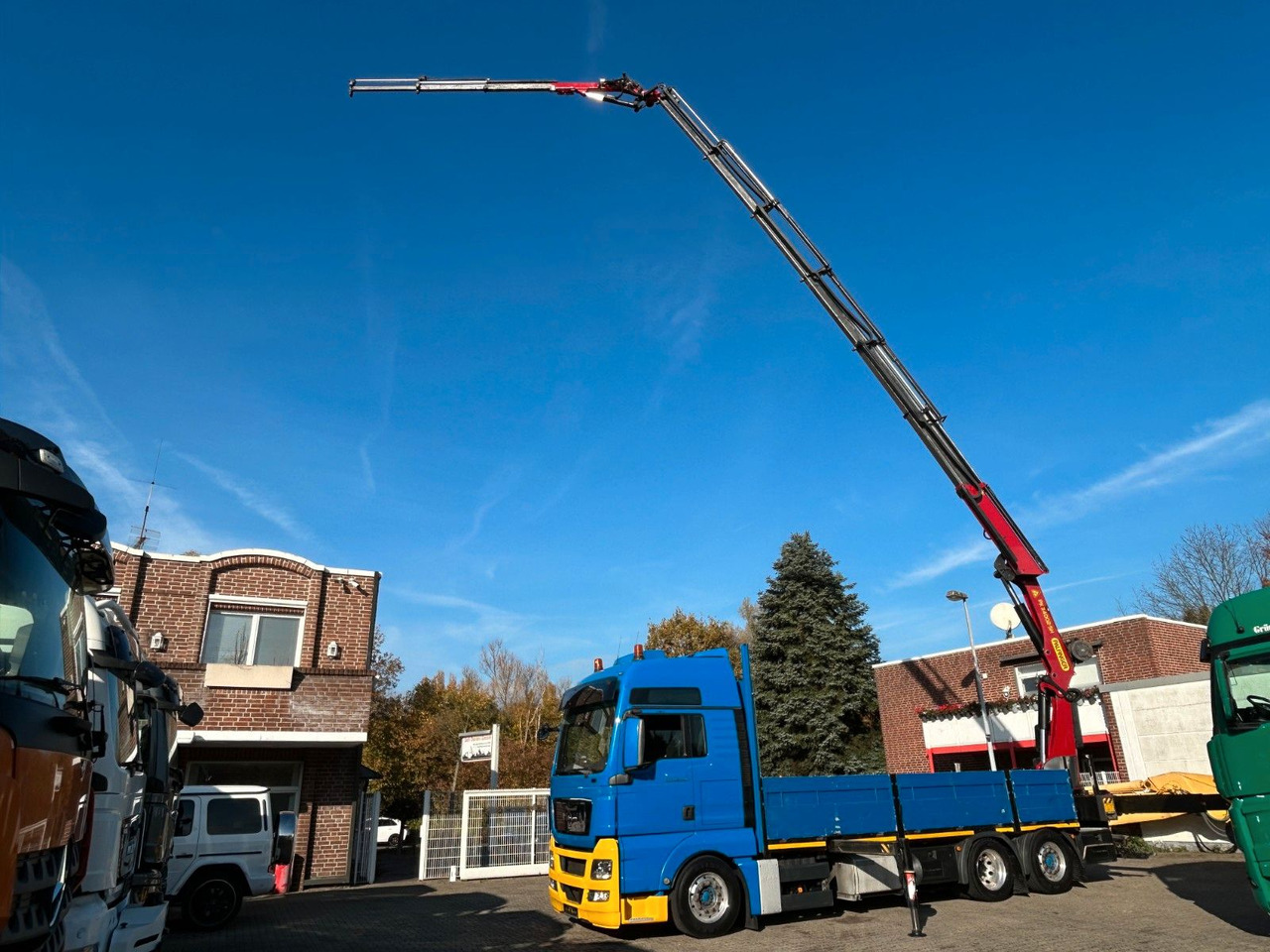 MAN 26.440 TGX Pritsche + PK 34002 + JIB Seilwinde - Kranbil: bilde 1 MAN 26.440 TGX Pritsche + PK 34002 + JIB Seilwinde - Kranbil: bilde 1