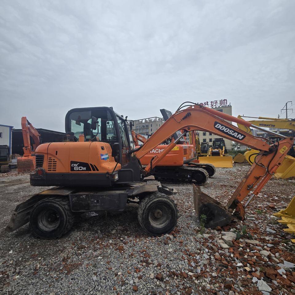 DOOSAN DX60W - Hjulgraver: bilde 1 DOOSAN DX60W - Hjulgraver: bilde 1