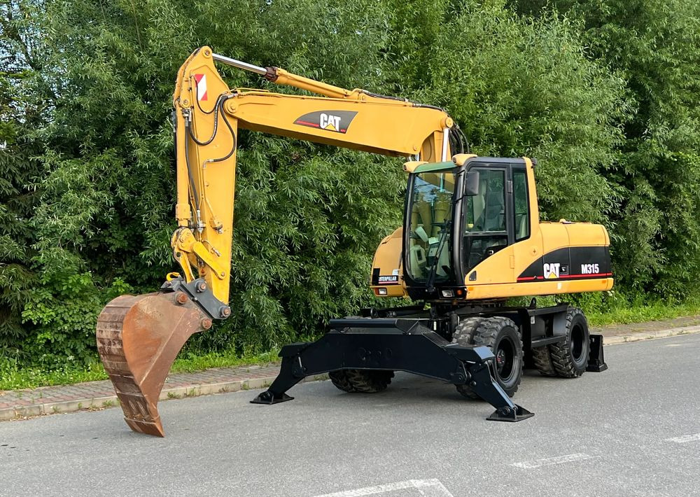 Caterpillar CAT M315C CATERPILLAR SPROWADZONY Bardzo Dobry Stan - Hjulgraver: bilde 1 Caterpillar CAT M315C CATERPILLAR SPROWADZONY Bardzo Dobry Stan - Hjulgraver: bilde 1