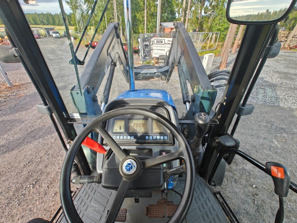Traktor New Holland TS100, ES vaihteisto, ilmastointi, etukuormaaja Ålö Q55, katso video!: bilde 18 Traktor New Holland TS100, ES vaihteisto, ilmastointi, etukuormaaja Ålö Q55, katso video!: bilde 18