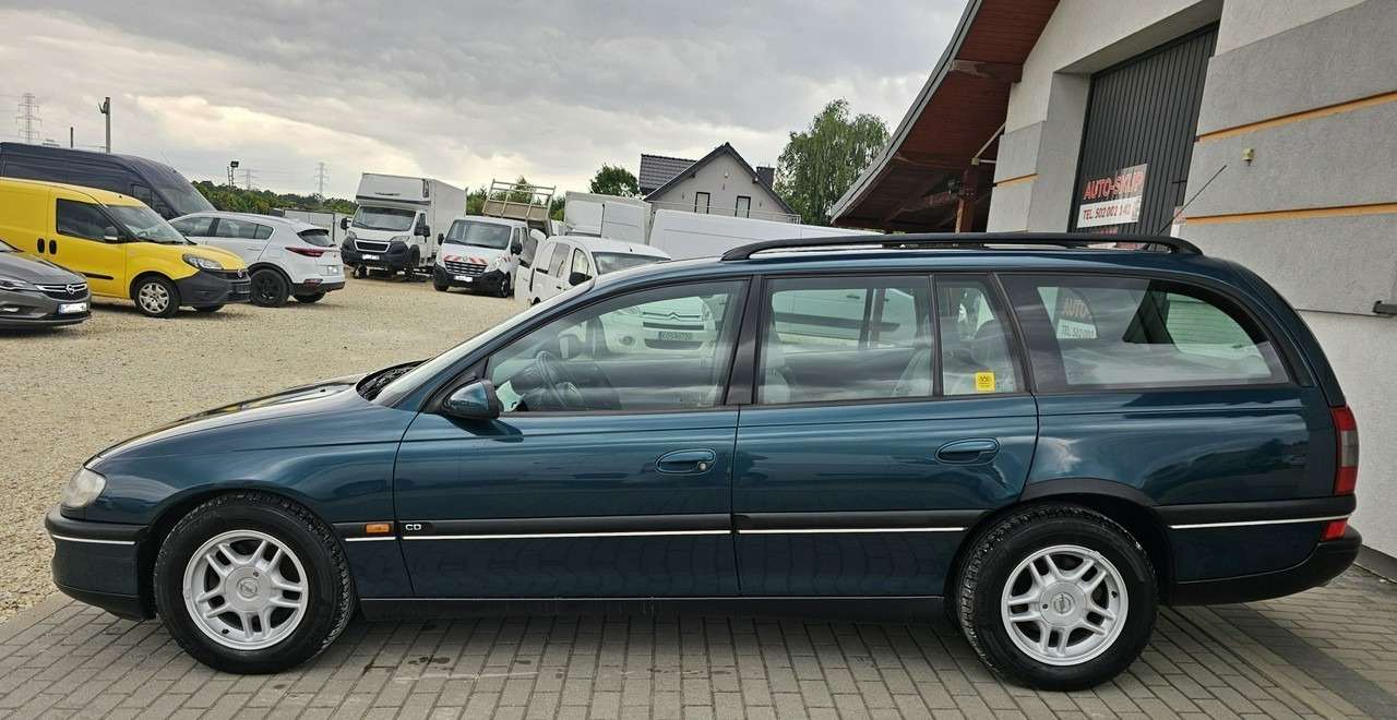 Opel Omega B 2,5 v6 *automat* napęd tył *welury* - Personenbil: bilde 4 Opel Omega B 2,5 v6 *automat* napęd tył *welury* - Personenbil: bilde 4