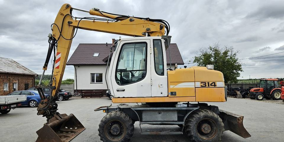 Koparka kołowa Liebherr A314 Litronic 9350 h+ 5 łyżek kołówka - Hjulgraver: bilde 1 Koparka kołowa Liebherr A314 Litronic 9350 h+ 5 łyżek kołówka - Hjulgraver: bilde 1