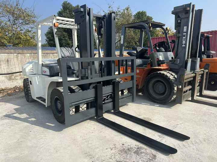 High Quality TCM 7 Ton with Hydraulic Distance Adjustment Used Forklift in Stock Used tcm Forklift 7 Ton Used tcm Fd70 Forklift - Gaffeltruck: bilde 3 High Quality TCM 7 Ton with Hydraulic Distance Adjustment Used Forklift in Stock Used tcm Forklift 7 Ton Used tcm Fd70 Forklift - Gaffeltruck: bilde 3