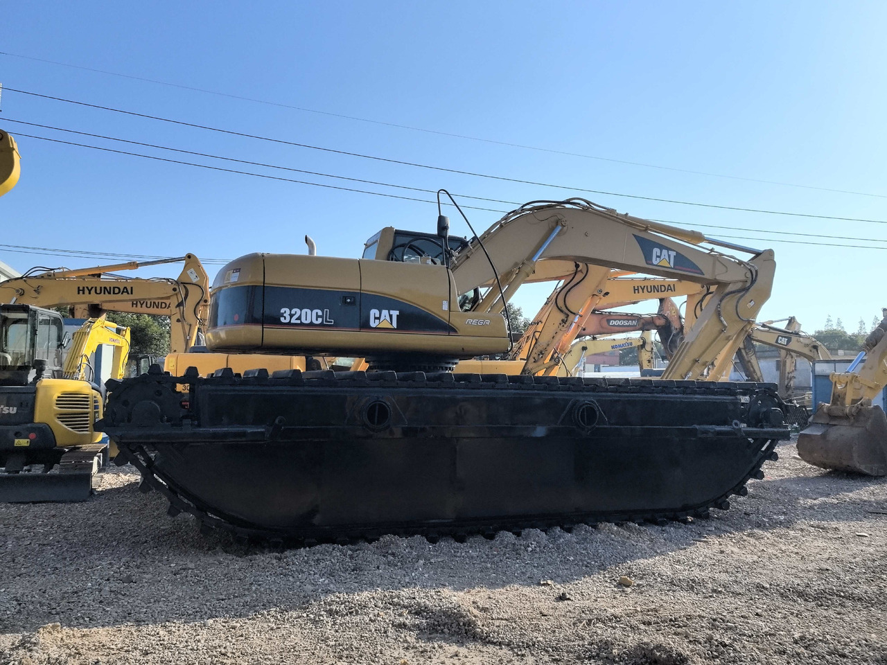CATERPILLAR 320C - Amfibisk gravemaskin: bilde 2 CATERPILLAR 320C - Amfibisk gravemaskin: bilde 2