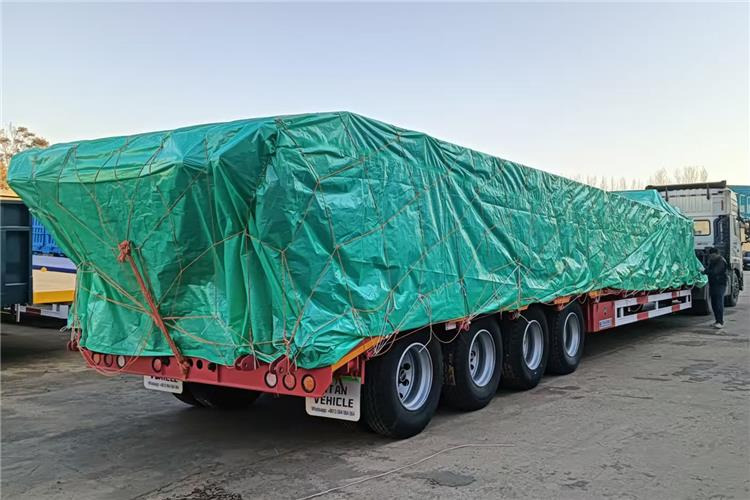 TITAN 4 Axle 100 Ton Low Bed Truck Trailer for Sale In Zambia - Lavloader semitrailer: bilde 1 TITAN 4 Axle 100 Ton Low Bed Truck Trailer for Sale In Zambia - Lavloader semitrailer: bilde 1