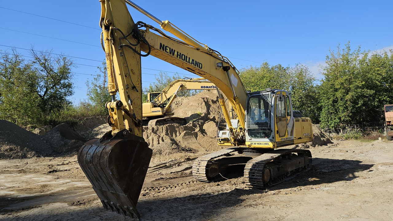 NEW HOLLAND E 245 B - Beltegraver: bilde 1 NEW HOLLAND E 245 B - Beltegraver: bilde 1