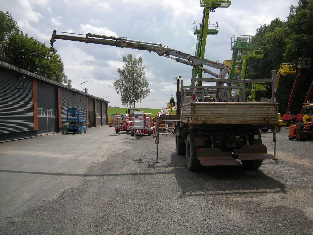 Mercedes-Benz Unimog U1250 mit Kran MKG 105 - Varebil med tipp: bilde 4 Mercedes-Benz Unimog U1250 mit Kran MKG 105 - Varebil med tipp: bilde 4
