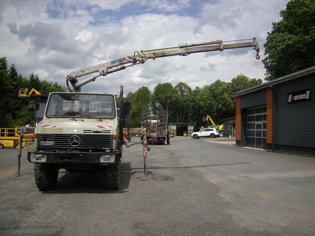 Mercedes-Benz Unimog U1250 mit Kran MKG 105 - Varebil med tipp: bilde 1 Mercedes-Benz Unimog U1250 mit Kran MKG 105 - Varebil med tipp: bilde 1