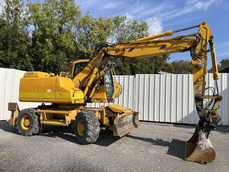 Volvo Pelle sur Pneus EW140D - Hjulgraver: bilde 1 Volvo Pelle sur Pneus EW140D - Hjulgraver: bilde 1