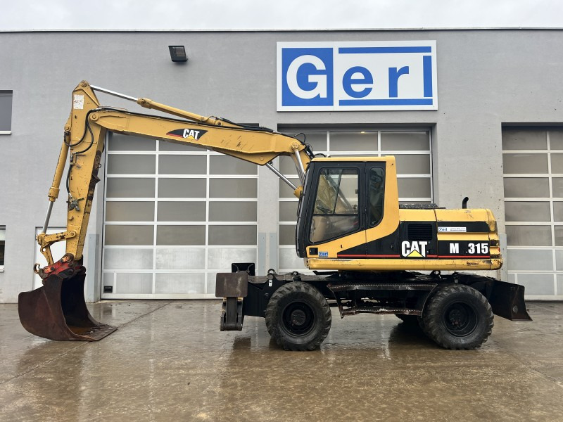 Caterpillar M 315 (111063) - Hjulgraver: bilde 1 Caterpillar M 315 (111063) - Hjulgraver: bilde 1