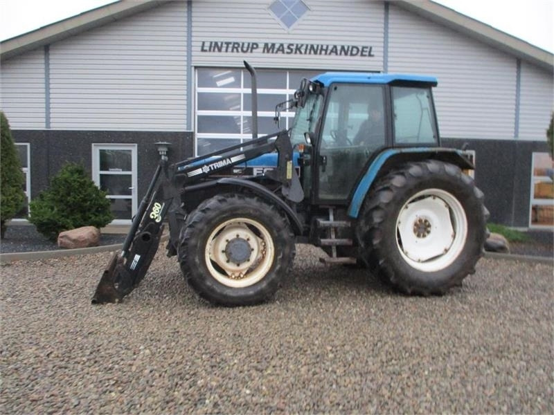 New Holland 7740 SLE Turbo Med frontlæsser og frontlift. - Traktor: bilde 1 New Holland 7740 SLE Turbo Med frontlæsser og frontlift. - Traktor: bilde 1