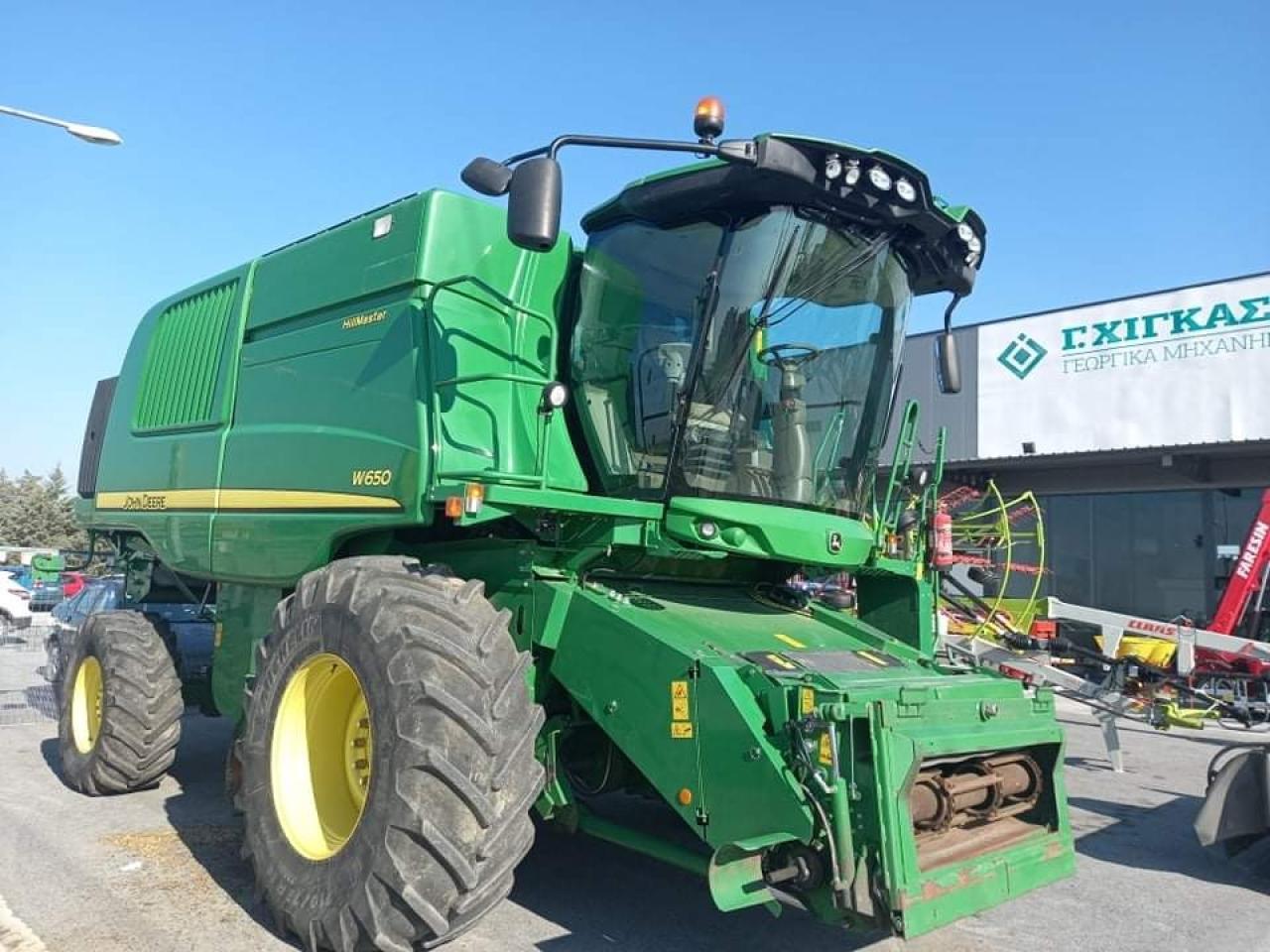 John Deere W650 - Skurtresker: bilde 1 John Deere W650 - Skurtresker: bilde 1