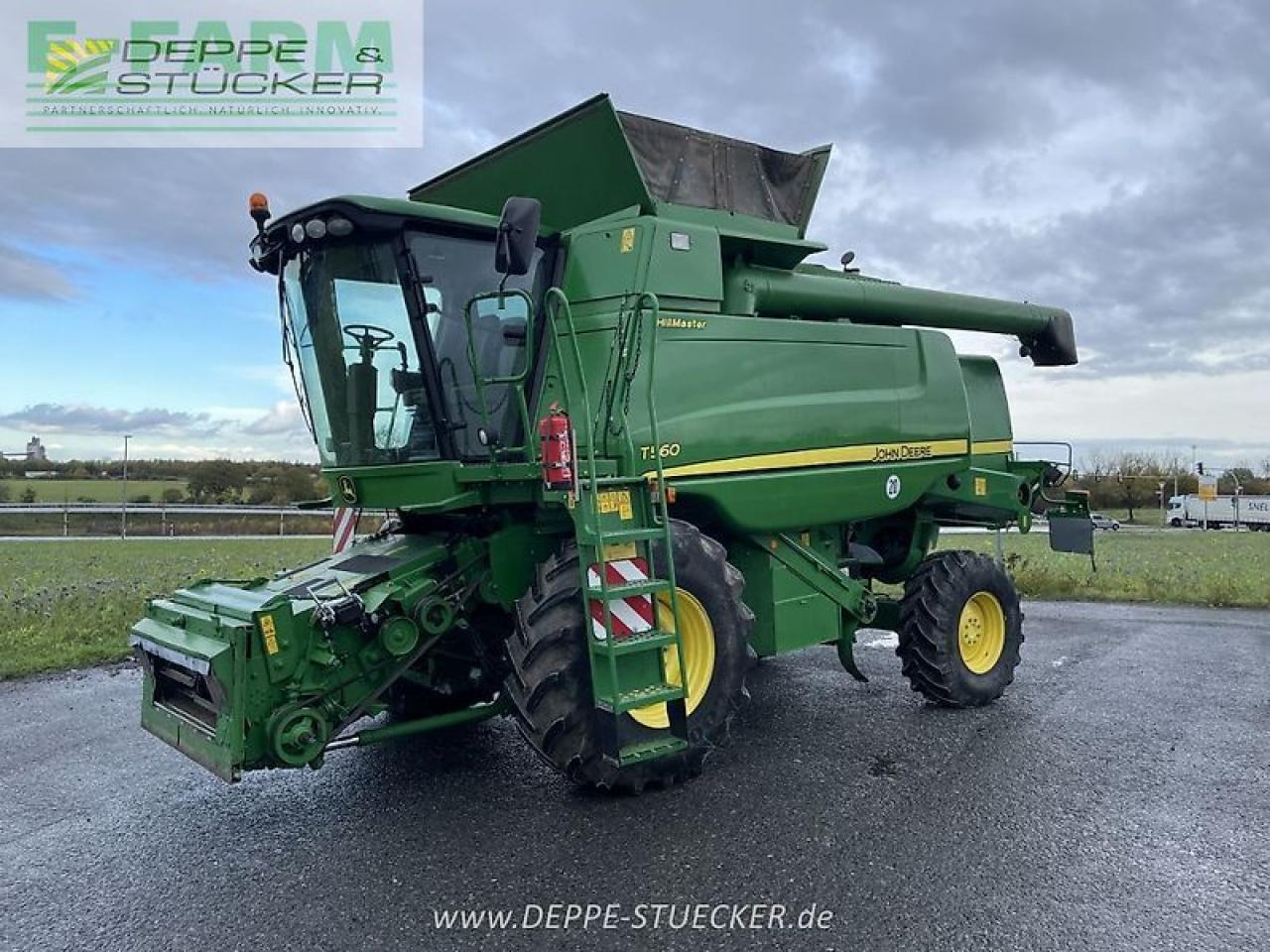 John Deere t560 hillmaster mit 620r und rapstisch - Skurtresker: bilde 1 John Deere t560 hillmaster mit 620r und rapstisch - Skurtresker: bilde 1