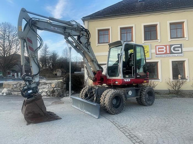 Takeuchi TB295W Mobilbagger - Gravemaskin: bilde 1 Takeuchi TB295W Mobilbagger - Gravemaskin: bilde 1