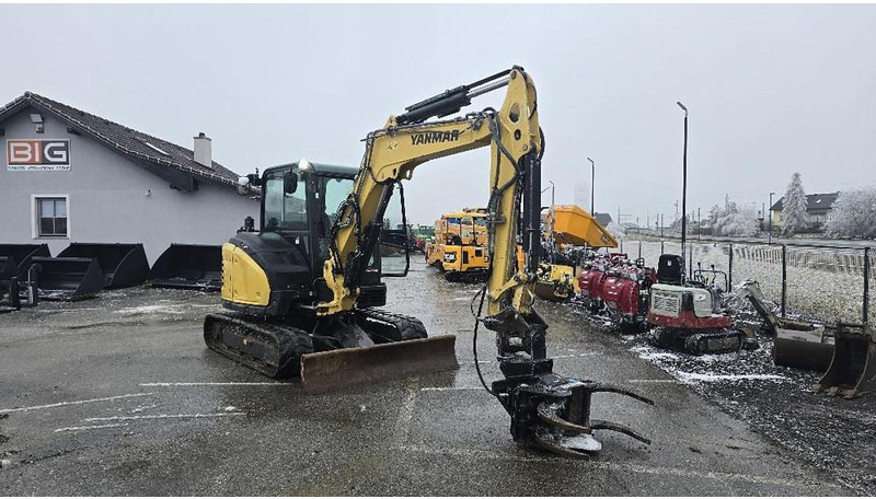 Yanmar SV60-A Bagger mit JAK 250 Fällgreifer - Gravemaskin: bilde 1 Yanmar SV60-A Bagger mit JAK 250 Fällgreifer - Gravemaskin: bilde 1