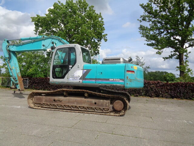 Kobelco SK250NLC - Beltegraver: bilde 1 Kobelco SK250NLC - Beltegraver: bilde 1