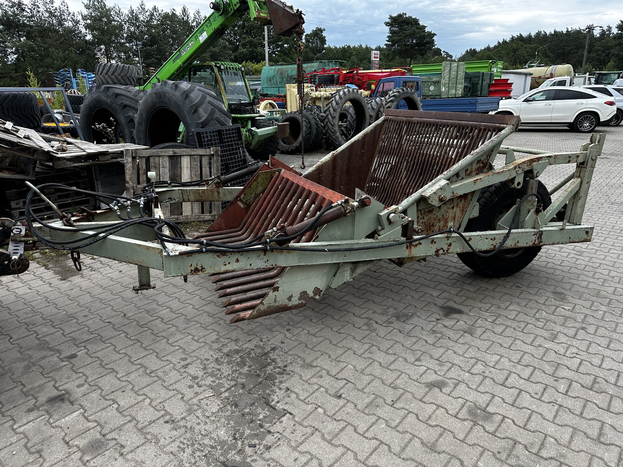 Zbieracz kamieni Fortschritt Steinsammler Steinsammelwagen - Jordforbedring maskin: bilde 1 Zbieracz kamieni Fortschritt Steinsammler Steinsammelwagen - Jordforbedring maskin: bilde 1