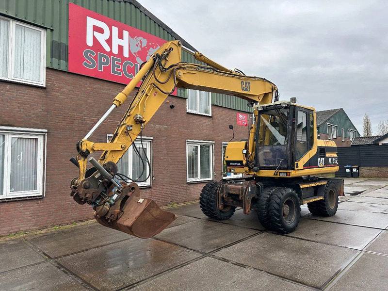 Caterpillar M315 +ROTO CE - Hjulgraver: bilde 2 Caterpillar M315 +ROTO CE - Hjulgraver: bilde 2