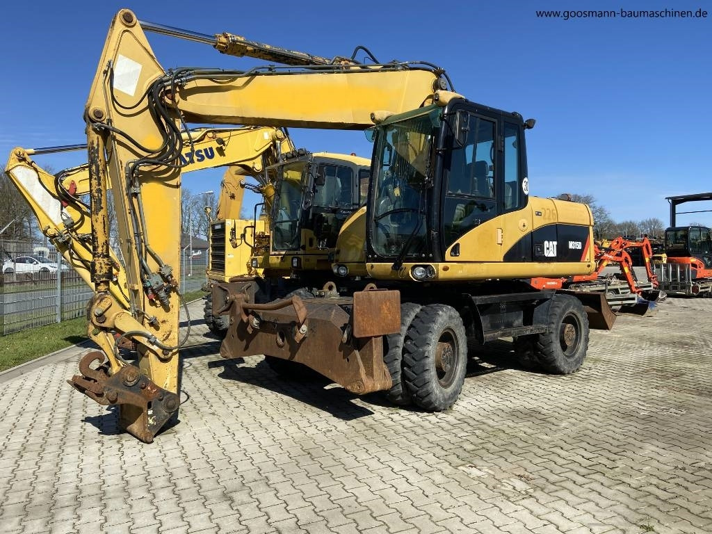 CAT M 315D - Hjulgraver: bilde 1 CAT M 315D - Hjulgraver: bilde 1