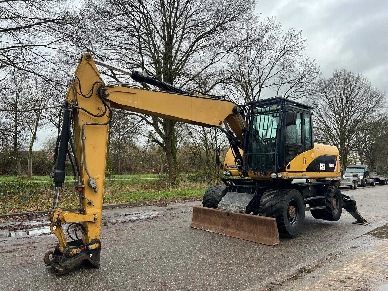 Caterpillar M316D - Hjulgraver: bilde 1 Caterpillar M316D - Hjulgraver: bilde 1