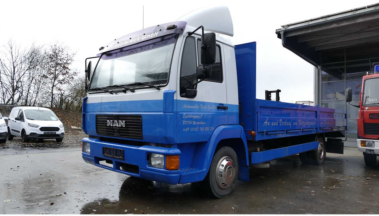 MAN - L 2000 TOW TRUCK - FLATBED - MACHINE TRANSPORTER - 1999 - TRUCKS - Lastebil: bilde 1 MAN - L 2000 TOW TRUCK - FLATBED - MACHINE TRANSPORTER - 1999 - TRUCKS - Lastebil: bilde 1