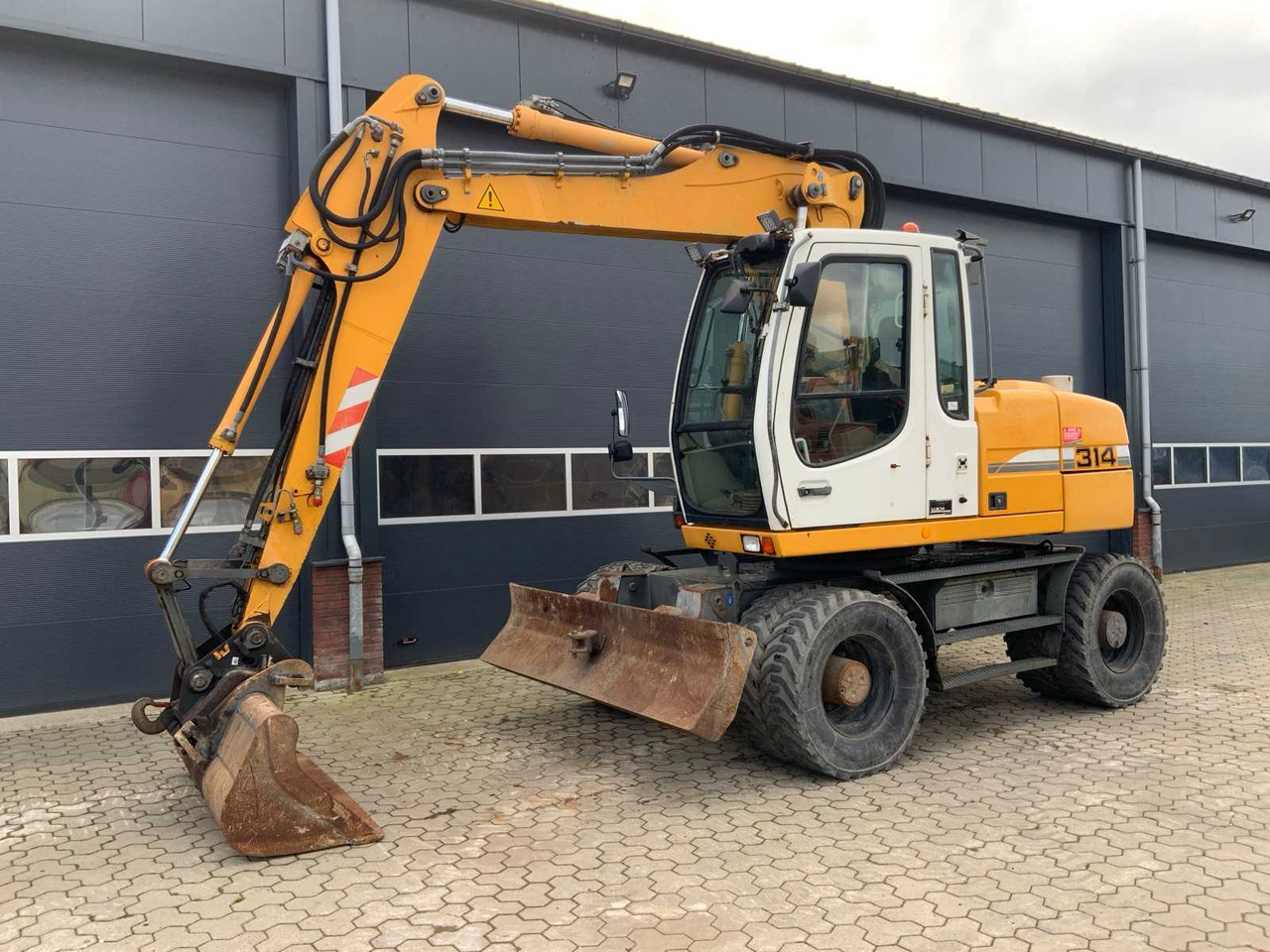 Liebherr A314 Litronic - Hjulgraver: bilde 1 Liebherr A314 Litronic - Hjulgraver: bilde 1