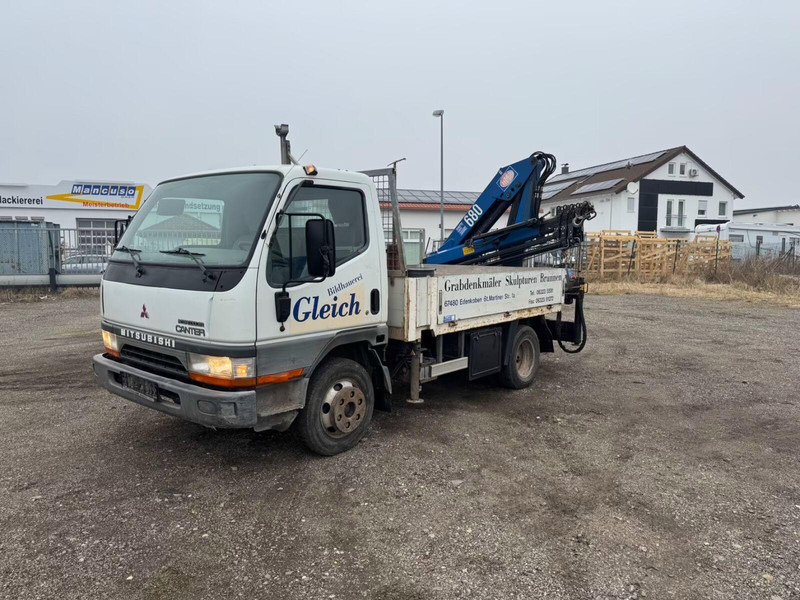 Mitsubishi Canter FE649 - Flatbed truck + crane - Planbil, Kranbil: bilde 1 Mitsubishi Canter FE649 - Flatbed truck + crane - Planbil, Kranbil: bilde 1