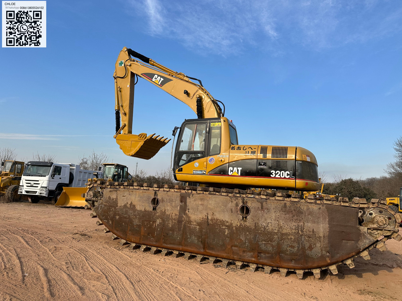 CATERPILLAR 320CL - Amfibisk gravemaskin: bilde 1 CATERPILLAR 320CL - Amfibisk gravemaskin: bilde 1