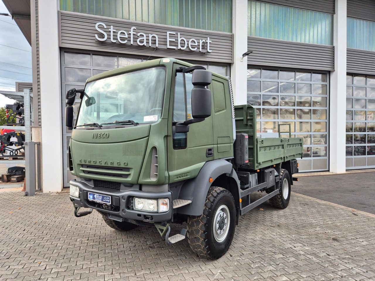 Iveco Eurocargo ML100E22WM-BW 4x4 Pritsche L-Haus Bett - Planbil: bilde 1 Iveco Eurocargo ML100E22WM-BW 4x4 Pritsche L-Haus Bett - Planbil: bilde 1