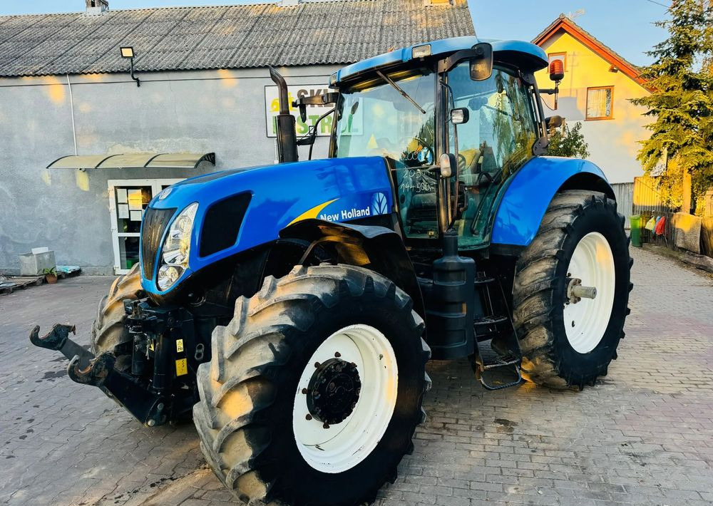 New Holland T7030 - Traktor: bilde 1 New Holland T7030 - Traktor: bilde 1