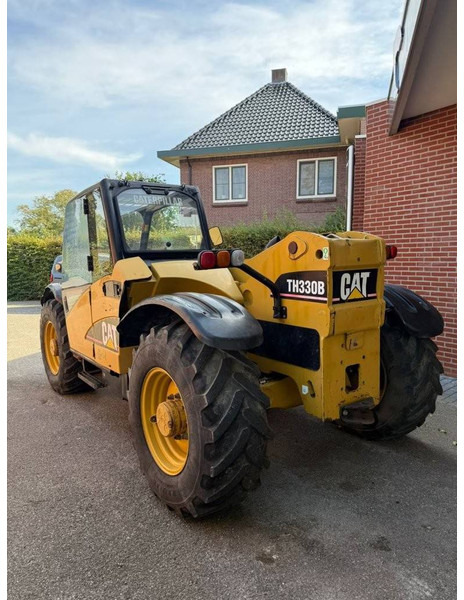 Caterpillar TH330B - Teleskoplastere: bilde 5 Caterpillar TH330B - Teleskoplastere: bilde 5