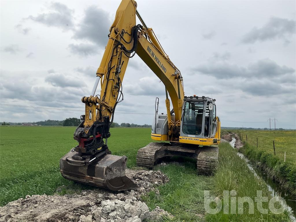 New Holland kobelco E235 B se - Beltegraver: bilde 1 New Holland kobelco E235 B se - Beltegraver: bilde 1