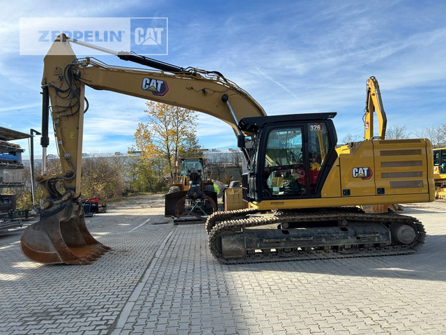 Cat 326-07 - Beltegraver: bilde 1 Cat 326-07 - Beltegraver: bilde 1